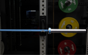 Barbell with weight plates on a weight rack