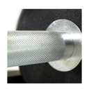 Close-up of a textured metal barbell handle on a black background