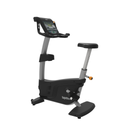 Upright exercise bike with digital display on a white background