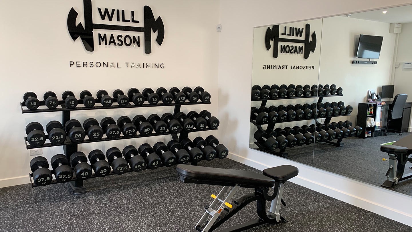 Will Mason Free Weight Area by Origin Fitness